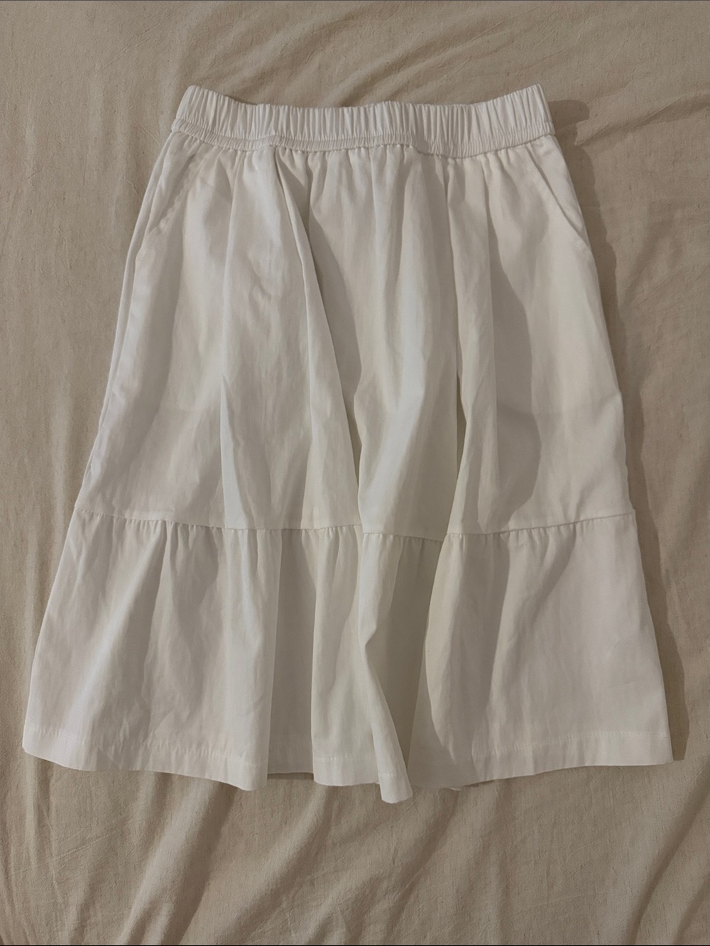 White tiered knee length skirt